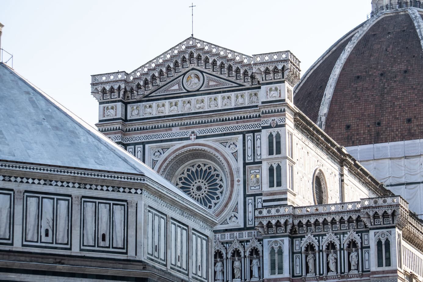 The Cathedral of Santa Maria del Fiore in Florence, Italy, also known as the Duomo, is a stunning example of Gothic architecture with its iconic red-tiled dome designed by Brunelleschi