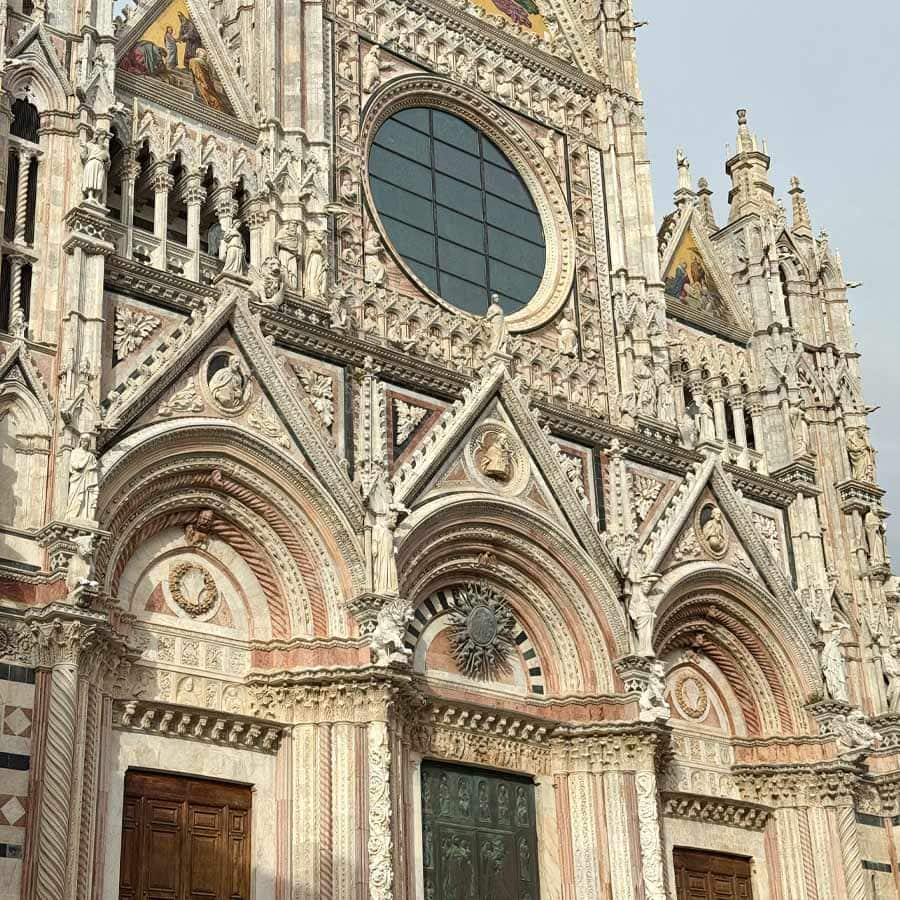 The stunning façade of Siena Cathedral, showcasing its Gothic and Romanesque architecture. Photo taken during a 2025 visit.