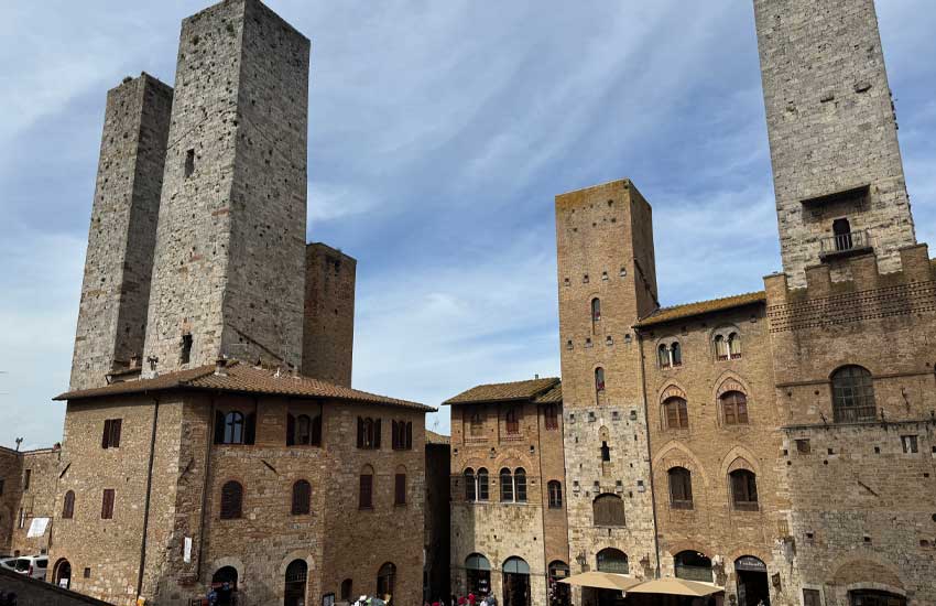 Medieval towers of San Gimignano under a blue sky in Tuscany, Italy