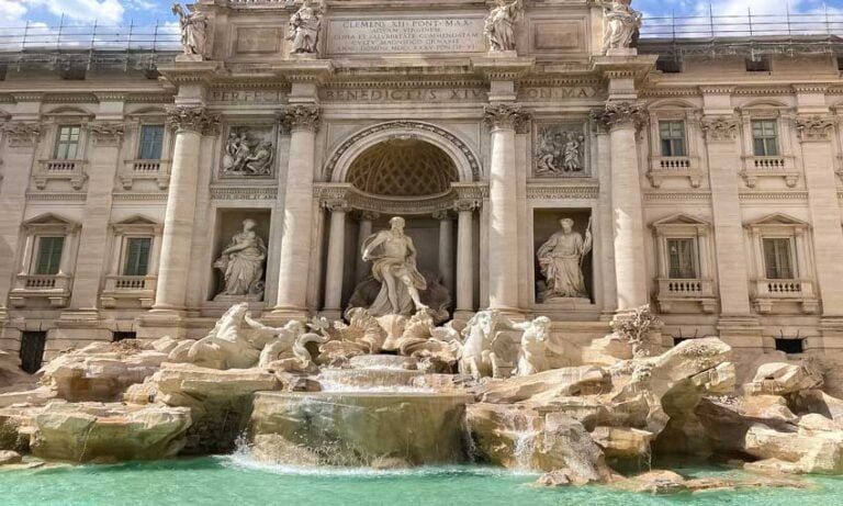 Trevi Fountain in Rome with Baroque statues and flowing water